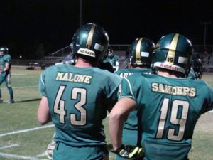 Wyatt Sanders and Kendall Malone getting ready for the game