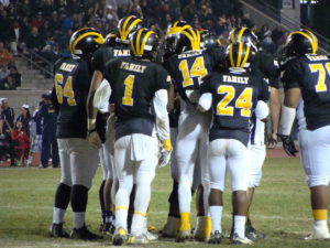 Edison in offensive huddle