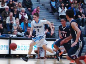 Ben Avera drives the ball to the hole. But Clovis North lost to Liberty-Bakersfield by 2 points. 