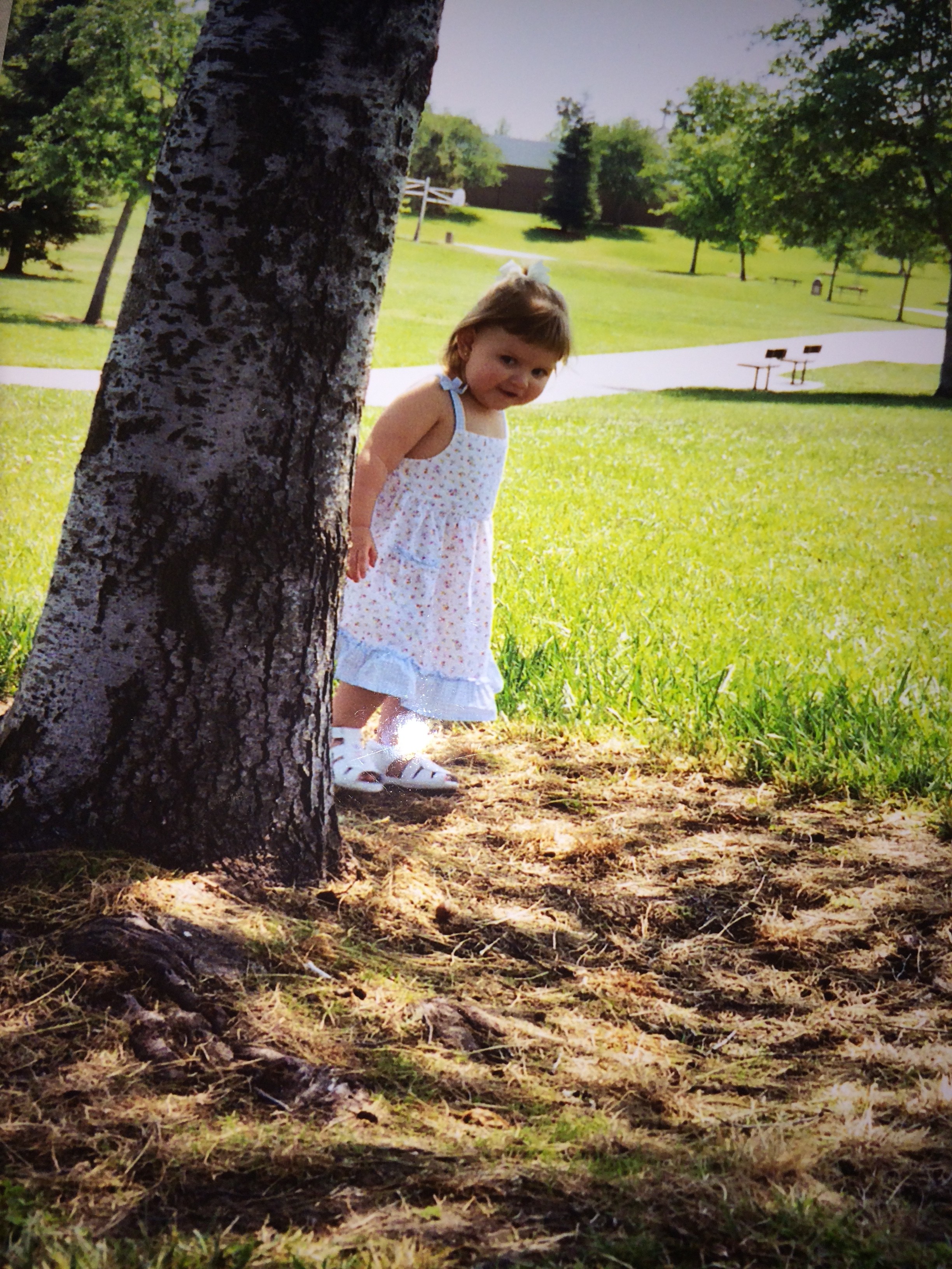 Peek-a-boo! (My daughter, about 10 years ago.)