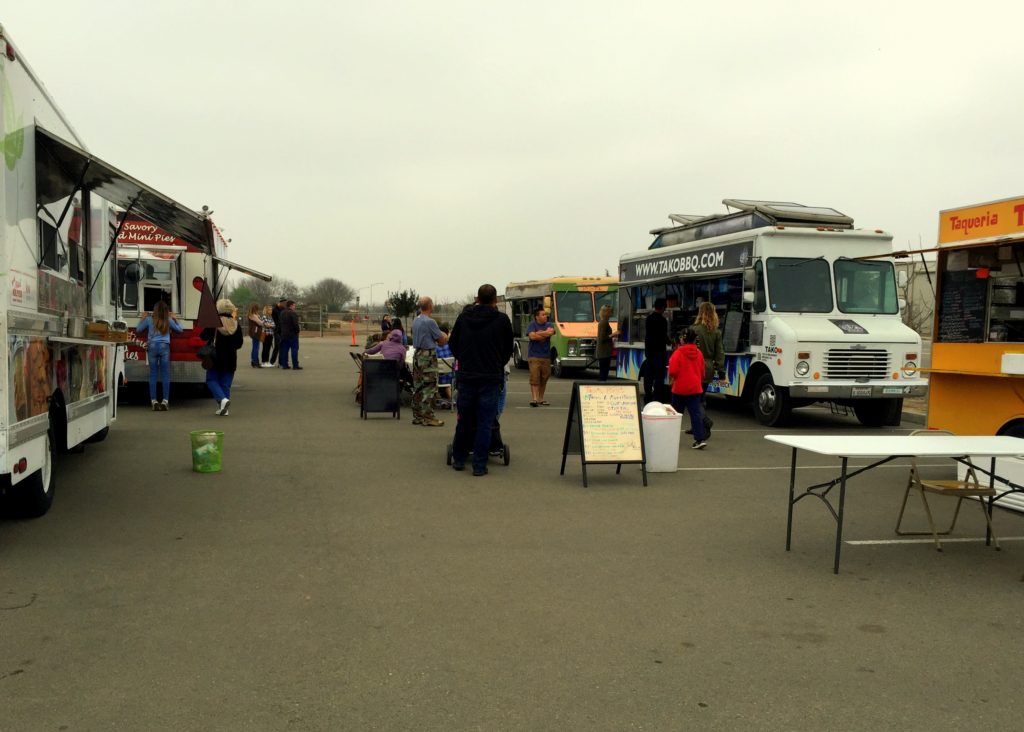 Food trucks parked and ready to serve lunch on a cloudy Saturday afternoon