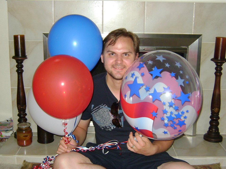 Red, white and blue balloons commemorate Vlad's new citizenship.