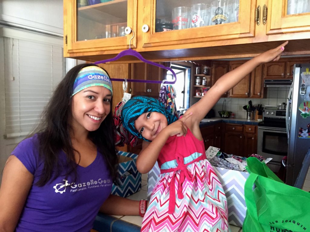 Farin Montanez and her daughter model two different ways to wear Gazelle Gear buffs.
