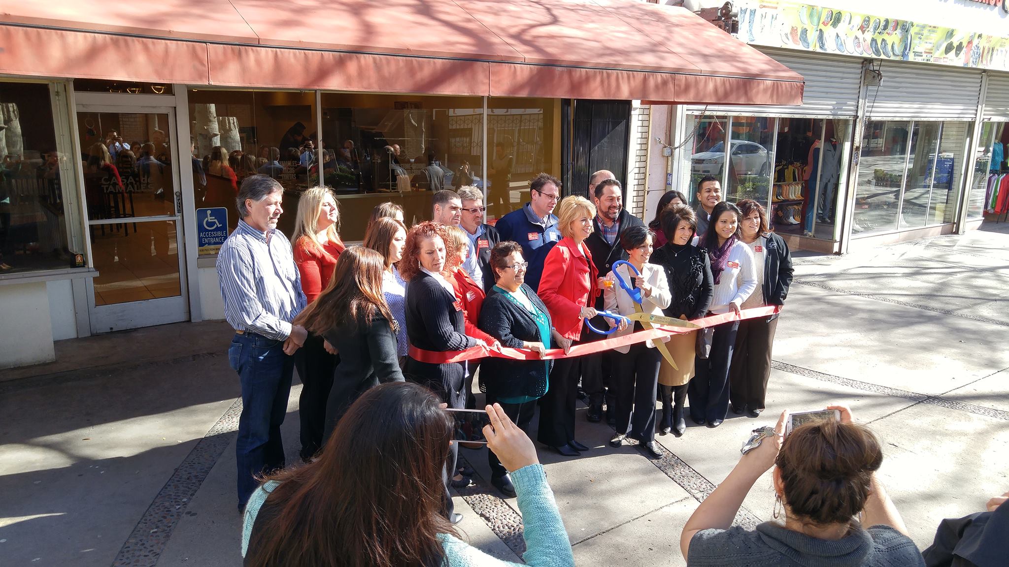 Mayor Swearengin and Liz Sanchez cut the ribbon to officially open the Casa de Tamales Fulton Mall location on February 1st