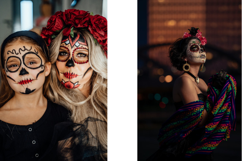 a Mother, child and woman in sugar skull decorations