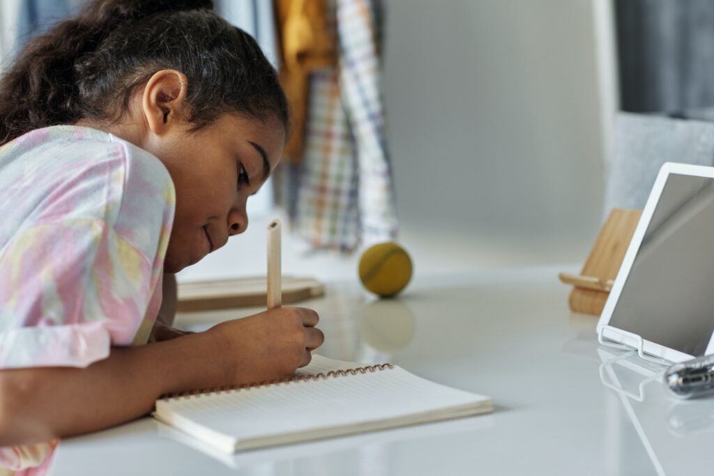 Child working on her homework