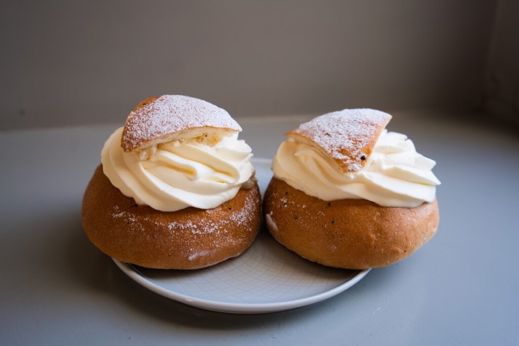 These are Semla, filled with an almond paste and whipped cream